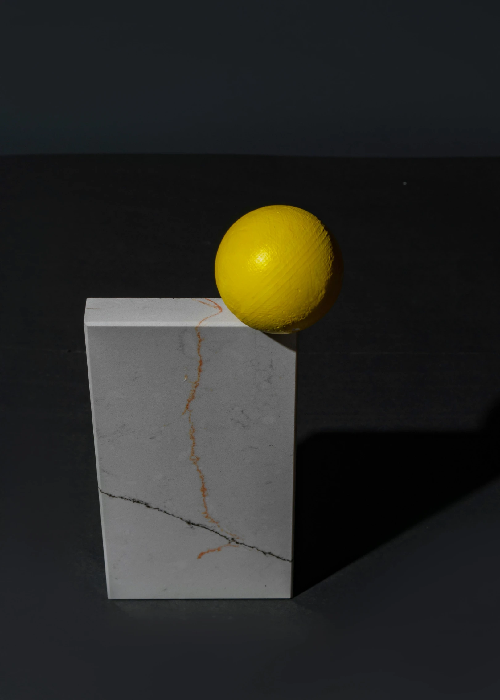 a lemon sitting on top of a marble block, an abstract sculpture, inspired by Lucio Fontana, conceptual art, launching a straight ball, houdini-hard-surface, glowing cracks, vertical