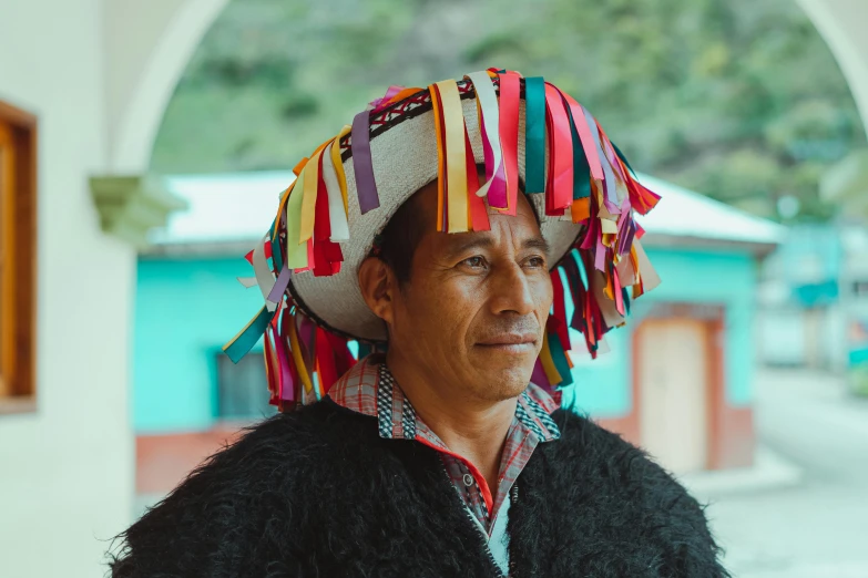a close up of a person wearing a hat, tachisme, macuahuitl, multi - coloured