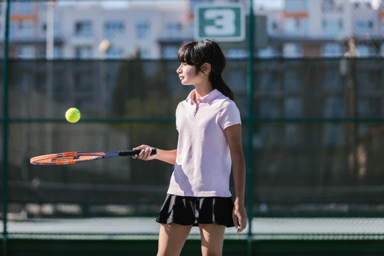 a woman standing on a tennis court holding a racquet, a picture, shutterstock, shin hanga, girl wearing uniform, pink, on set, fujifilm”