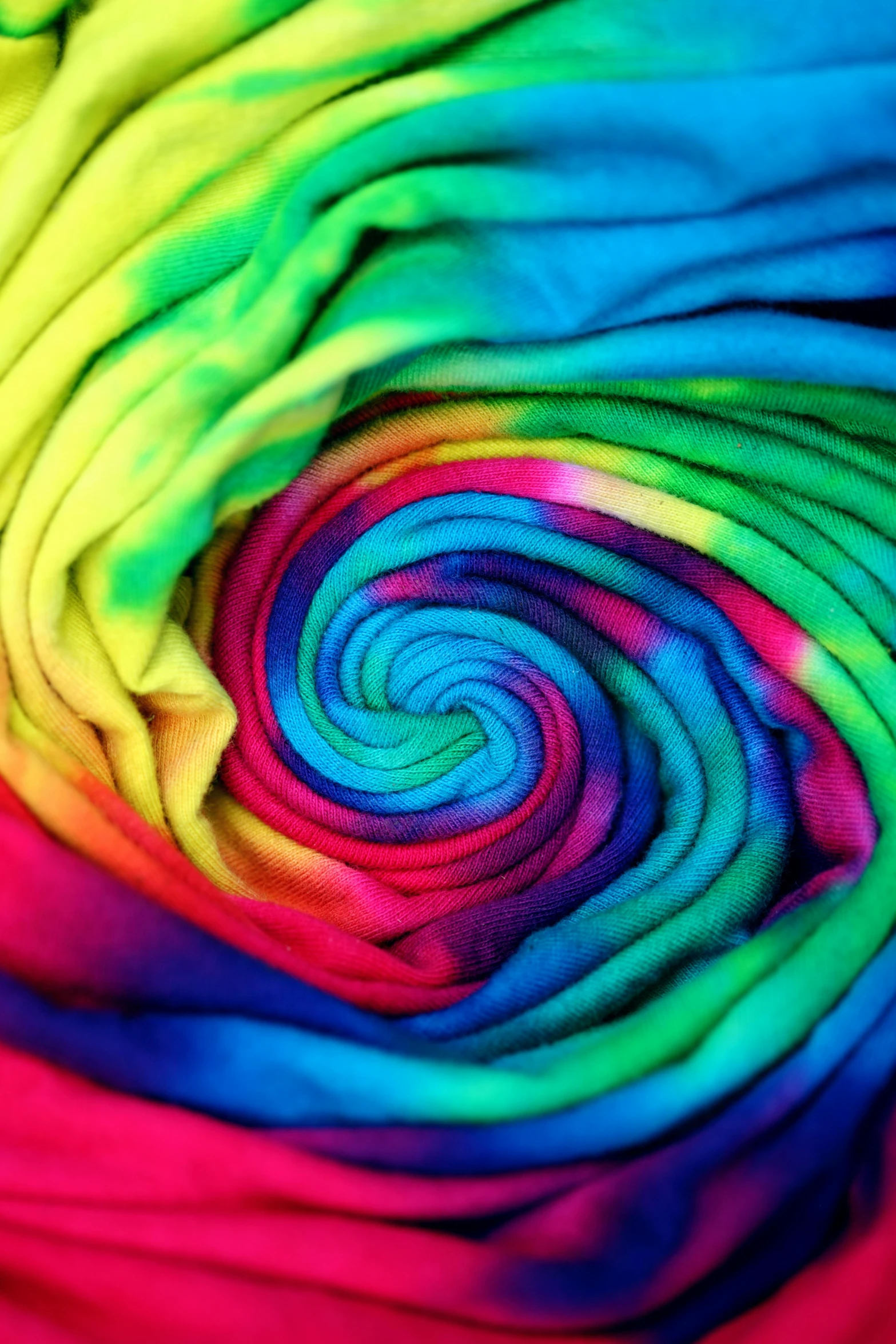 a close up of a rainbow colored fabric, wearing a tie-dye t-shirt, swirly tubes, 2 5 6 colours, rainbowcore