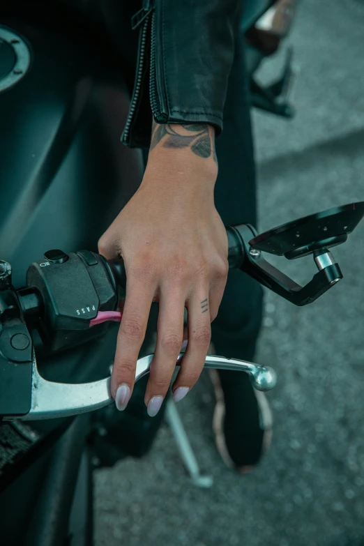 a close up of a person on a motorcycle, a tattoo, trending on pexels, hands reaching for her, switch, pink, levers