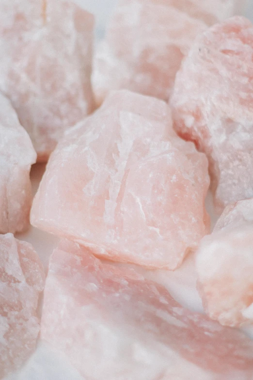 a pile of pink rocks sitting on top of a white plate, close up of single sugar crystal, detailed product image, petite, albino