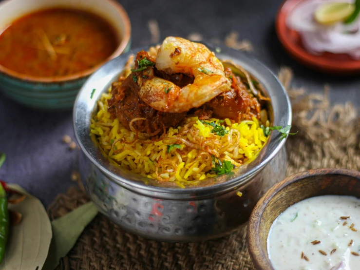 a close up of a bowl of food on a table, hurufiyya, indore, prawn, listing image, yellow