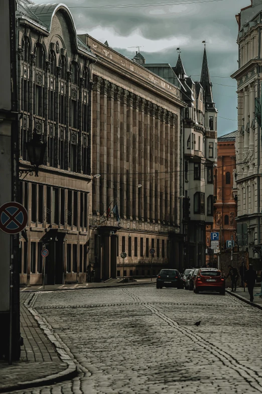 a cobblestone street in a european city, a photo, pexels contest winner, neo classical architecture, square, distant photo, brown
