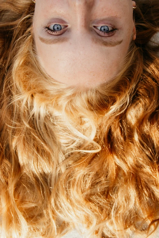 a close up of a person with long red hair, pale skin curly blond hair, chest hair, half & half hair, close - up photograph