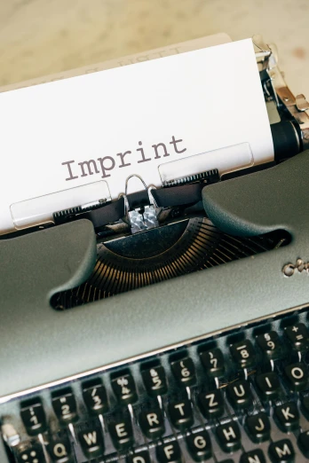 an old typewriter with the word imprint on it, a photocopy, inspired by Franz von Lenbach, unsplash, implants, etsy, infinite, imp