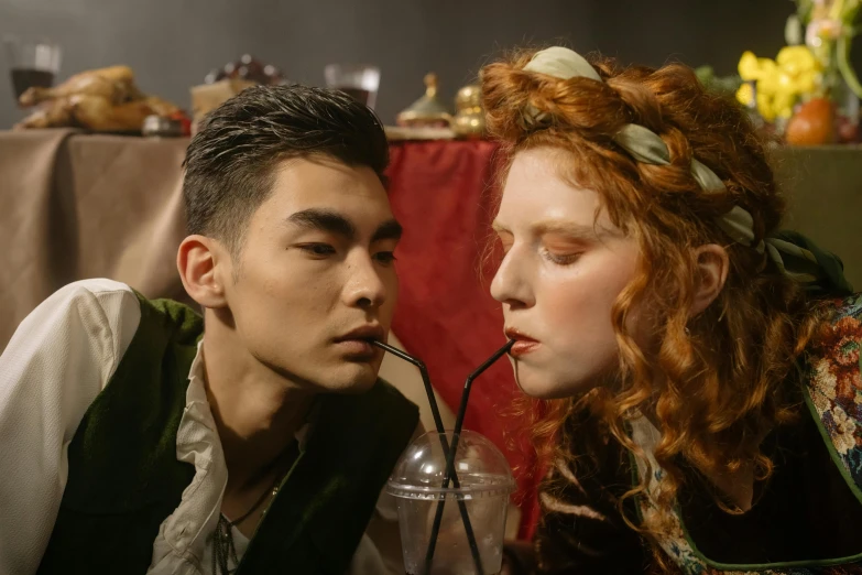 a man and a woman sitting next to each other, inspired by Georges de La Tour, trending on pexels, renaissance, cai xukun, eleanor tomlinson, cosplay photo, drinking