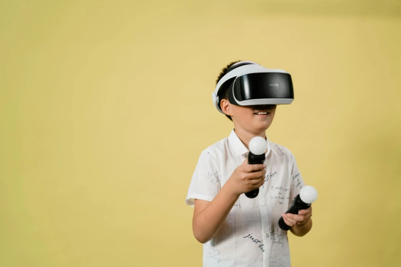 a young boy wearing a virtual reality headset, pexels, interactive art, holding a microphone, avatar image, full shot photograph, thumbnail