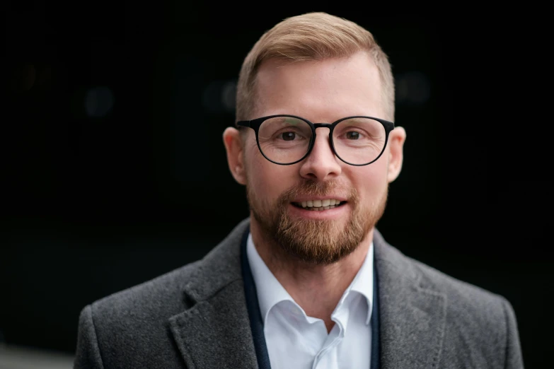 a close up of a person wearing glasses, a picture, tarmo juhola, professional picture, owen klatte, high quality image