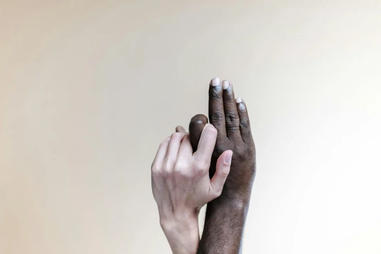 a person with their hands in the air, by Matija Jama, visual art, grey skin, two people, brown and white color scheme, holding an epée
