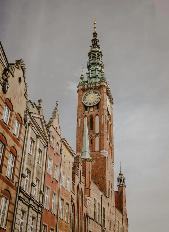 a tall clock tower towering over a city street, a photo, by Emma Andijewska, pexels contest winner, baroque, zdzisław, square, high resolution photo, to