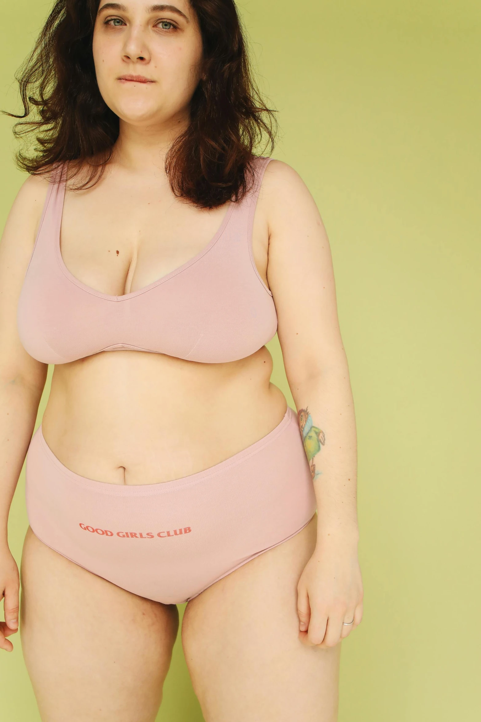 a woman in a pink underwear posing for a picture, full figured mother earth, gemma chen, round-cropped, curated collection