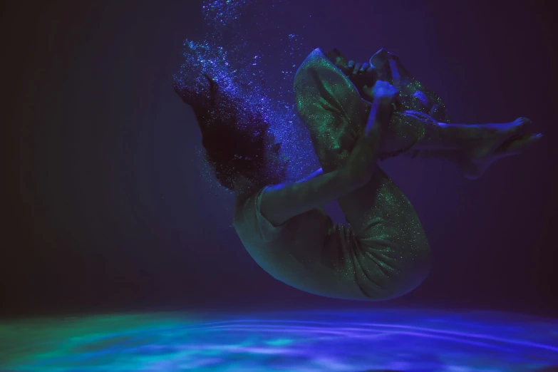 a person that is in the air in the water, inspired by Brooke Shaden, pexels contest winner, 3 d neon art of a womens body, contemporary dance, deep color, blue