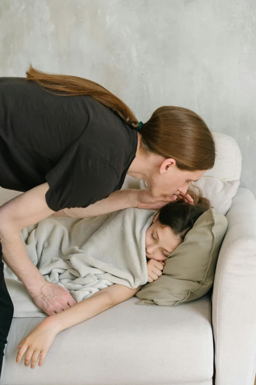 a woman that is laying down on a couch, comforting and familiar, muscular and exhausted woman, jovana rikalo, spitting cushions from his mouth