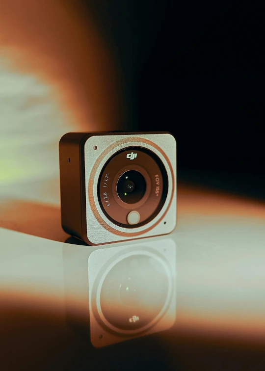 a small camera sitting on top of a table, a hologram, by Dan Christensen, unsplash, cubo-futurism, wide angle lens. 8 k, damaged webcam image, hasselblad quality, super high resolution