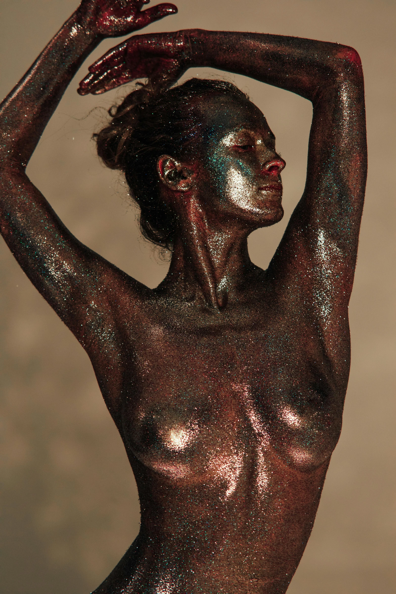 a woman that has some paint on her body, a statue, inspired by Hedi Xandt, featured on zbrush central, brown red blue, metallic flecks, model, made of bronze
