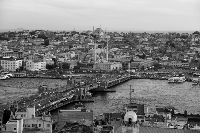 a black and white photo of a city, by Niyazi Selimoglu, pexels contest winner, hurufiyya, ottoman empire, lots of bridges, high quality upload, color photo