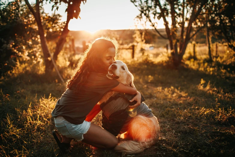 a woman hugging a dog in a field, pexels contest winner, golden sunlight, australian, teenage girl, instagram photo