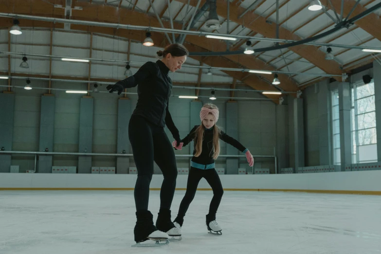 a woman teaching a young girl how to skate, by Emma Andijewska, incoherents, 4 k cinematic still, full body image, promotional image, thumbnail