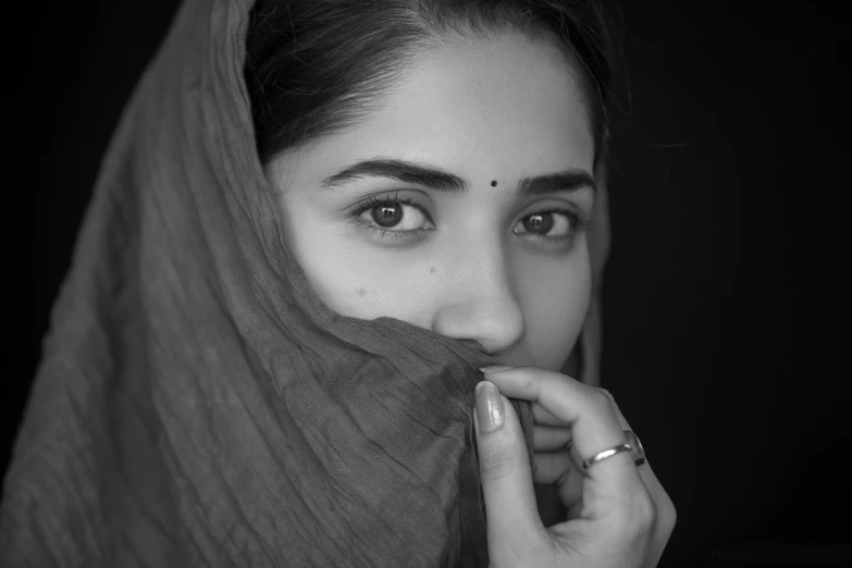 a woman with a veil covering her face, inspired by Yousuf Karsh, pexels contest winner, hyperrealism, monochrome:-2, maya ali as d&d mage, a cute young woman, casual pose