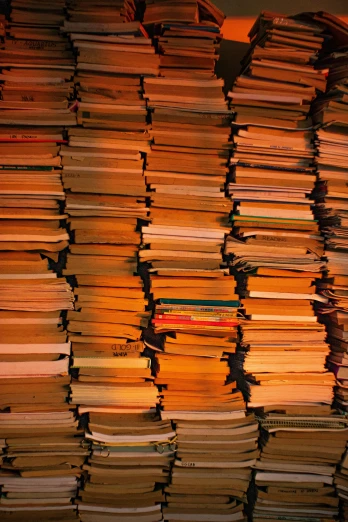 a bunch of books stacked on top of each other, an album cover, flickr, orange, piles of paperwork, in 2 0 1 5, voluminous