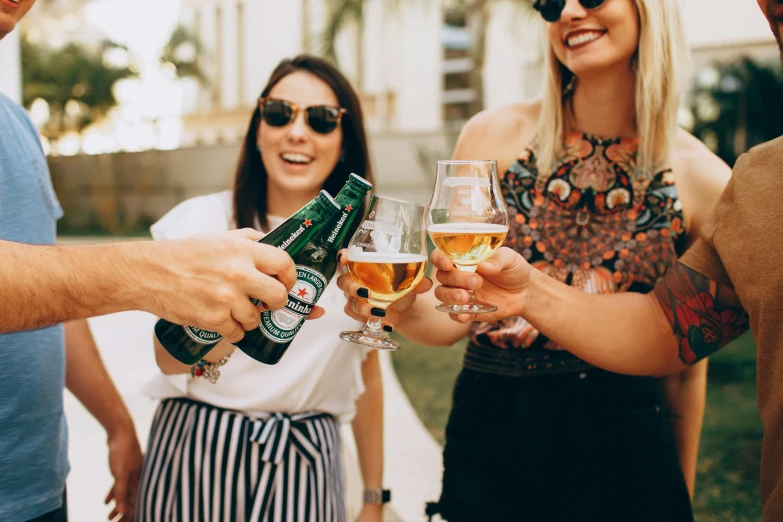 a group of people standing next to each other holding wine glasses, pexels contest winner, happening, holding a can of beer, summer vibe, te pae, girls