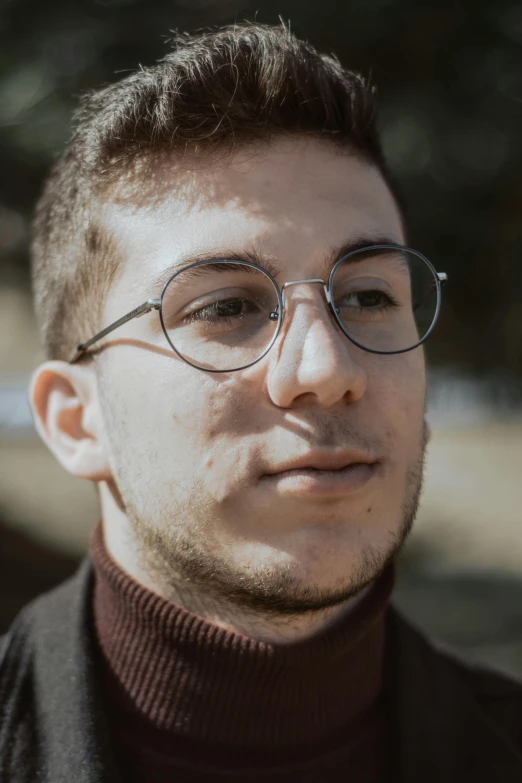 a close up of a person wearing glasses, young greek man, wearing turtleneck, 2019 trending photo, color photo