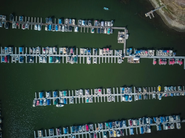 a number of boats in a body of water, pexels contest winner, boat dock, satellite imagery, color ( sony a 7 r iv, rectangle