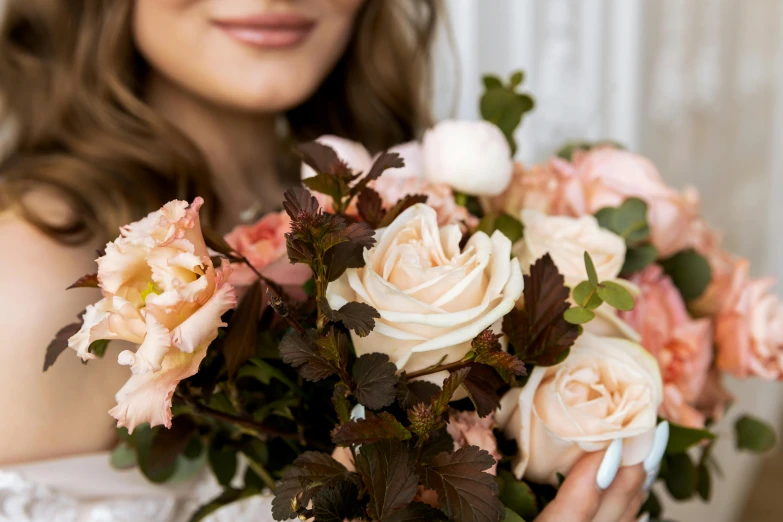 a woman in a wedding dress holding a bouquet of flowers, inspired by Rose O’Neill, trending on pexels, in shades of peach, close up face, rose-brambles, entertaining