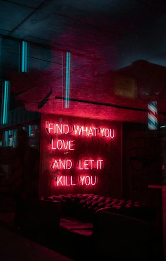 a neon sign that says find what you love and let it kill you, pexels, multiple stories, reds, death, light room