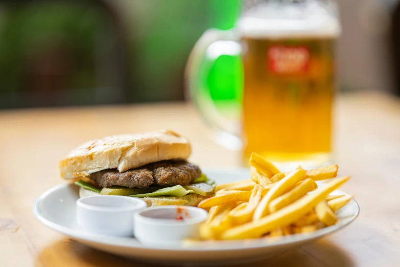 a hamburger and fries on a plate on a table, by Tuvia Beeri, drink, daily specials, white, brown
