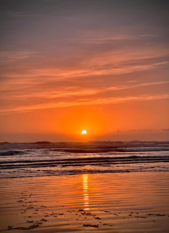 the sun is setting over the water on the beach, by Jessie Algie, pexels contest winner, haida, golden bay new zealand, profile image, slide show