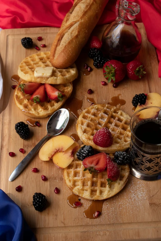 a wooden cutting board topped with waffles and fruit, malt, moroccan, 6 pack, fan favorite