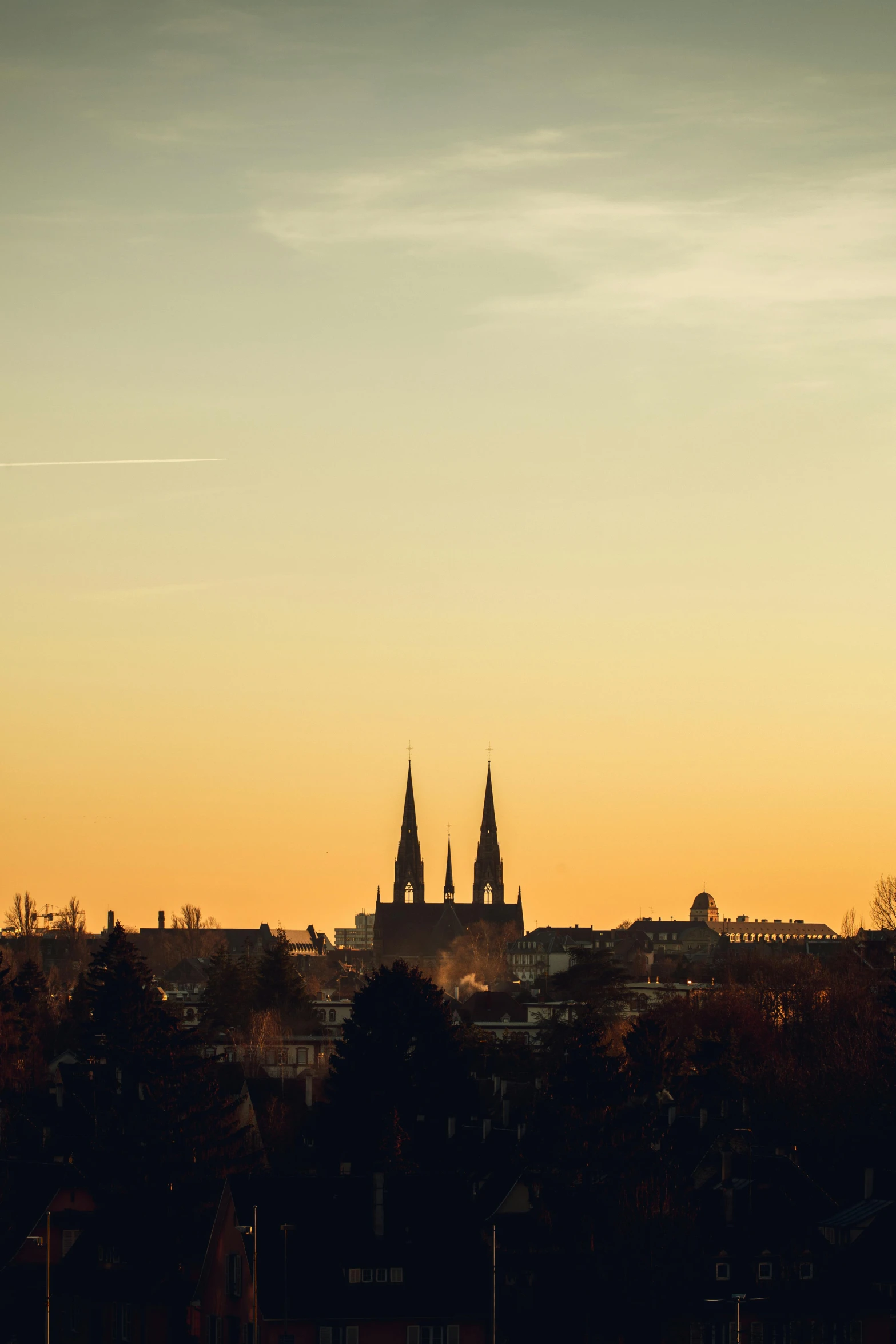 a view of a city from the top of a hill, by Tobias Stimmer, pexels contest winner, chartres cathedral, sunset!, 2 5 6 x 2 5 6, detmold