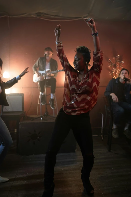 a group of people that are standing in a room, an album cover, pexels, happening, performing a music video, ( ( theatrical ) ), dramatic scene, singing