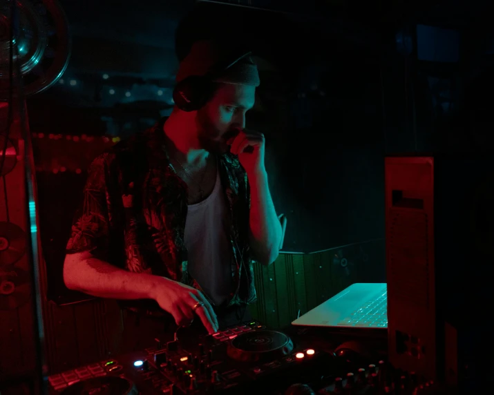 a man that is standing in front of a laptop, during the night, djing with dj turntables, 15081959 21121991 01012000 4k, threyda