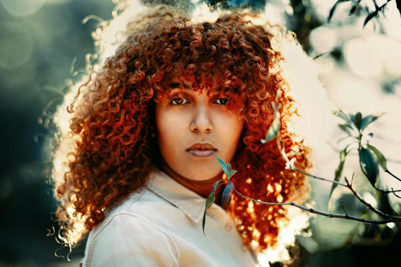 a woman with red curly hair wearing a white shirt, pexels contest winner, zenra taliyah, solarised, curly bangs, josh grover