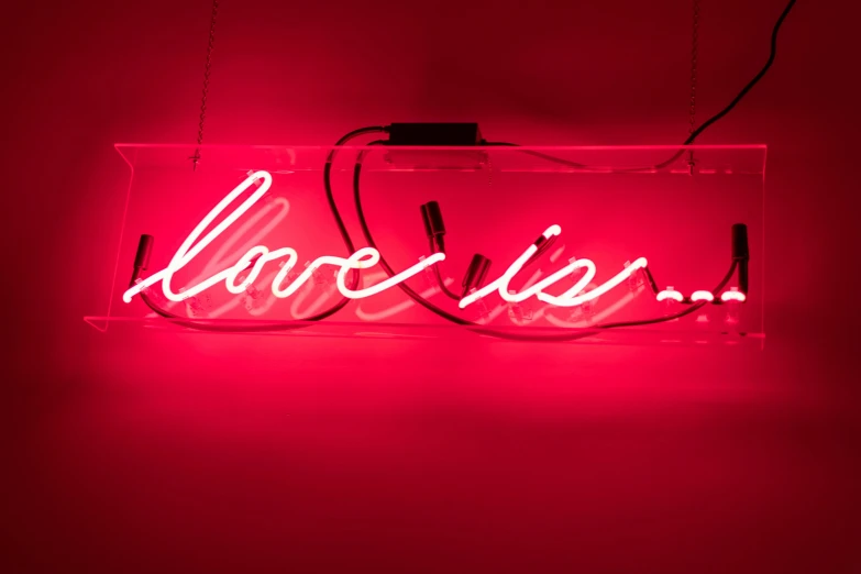 a neon sign that says love lies on it, an album cover, by Tracey Emin, pexels, his one yes glow red, signed, detail, ƒ/5.6