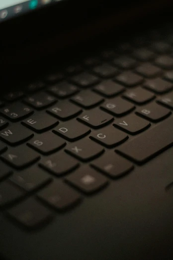 a close up of a keyboard on a laptop, by Adam Marczyński, it's dark, up close image, dark. no text, profile picture 1024px
