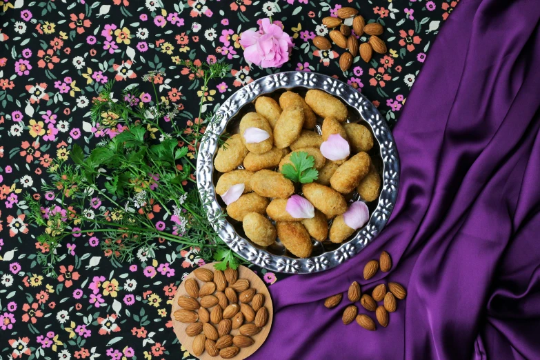 a bowl filled with nuts on top of a purple cloth, dau-al-set, flowers around, background image, piroca, crisp image