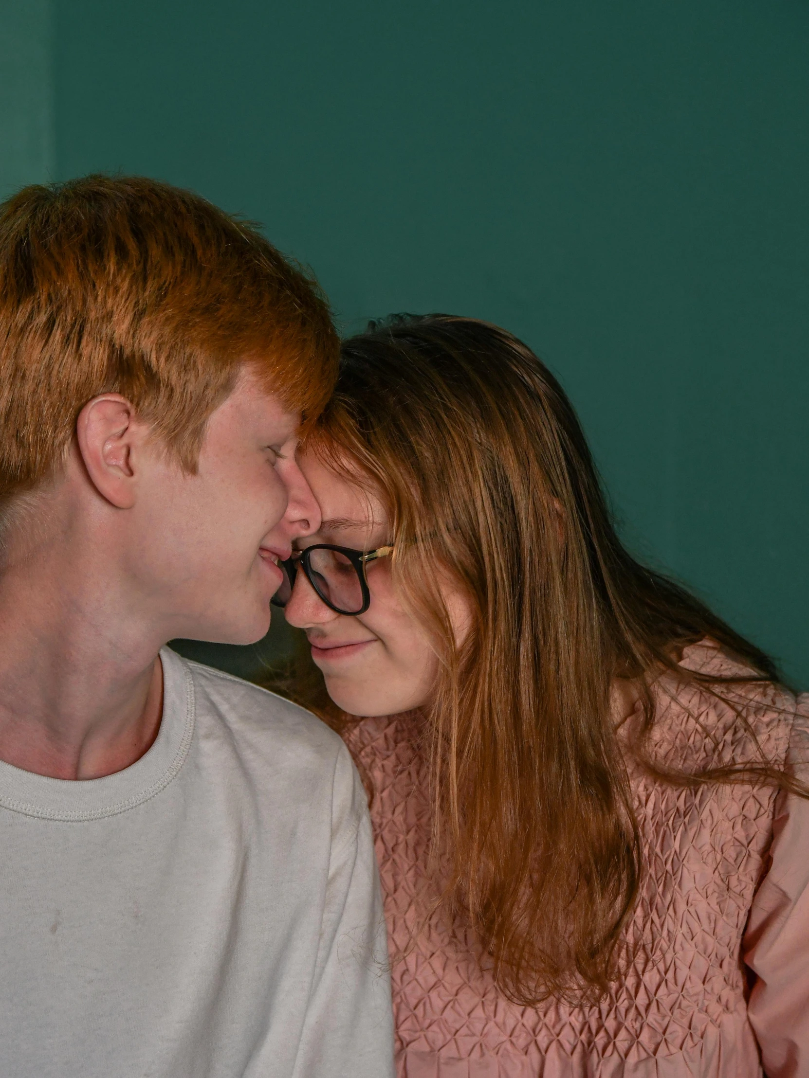 a man and a woman sitting next to each other, trending on reddit, ginger hair with freckles, lesbian kiss, full frame image, high resolution image