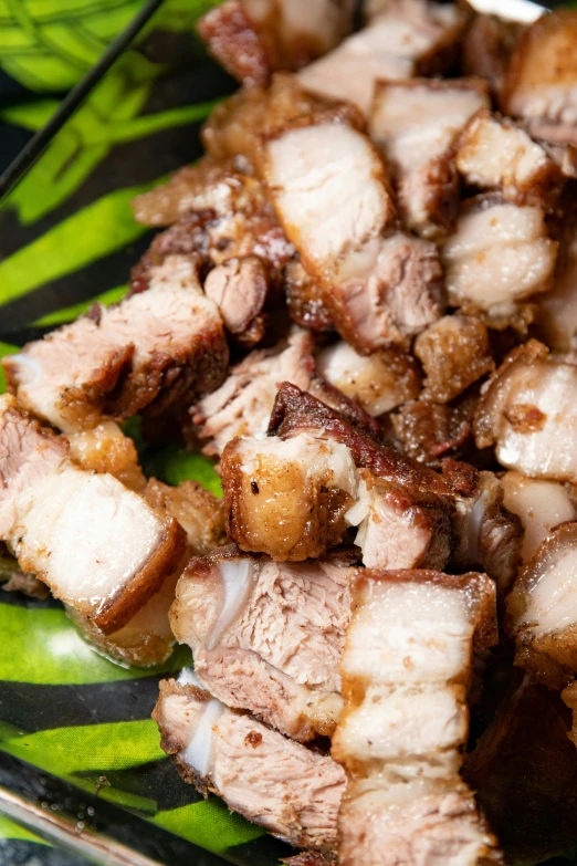 a close up of a plate of food on a table, pork, 6 pack, thumbnail, bongos