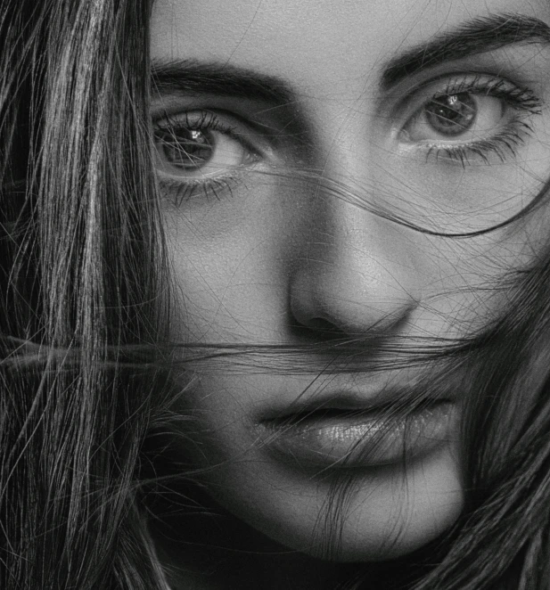 a black and white photo of a woman with long hair, by irakli nadar, photorealism, big eyebrows, portrait. 8 k high definition, professional retouch, ana de armas