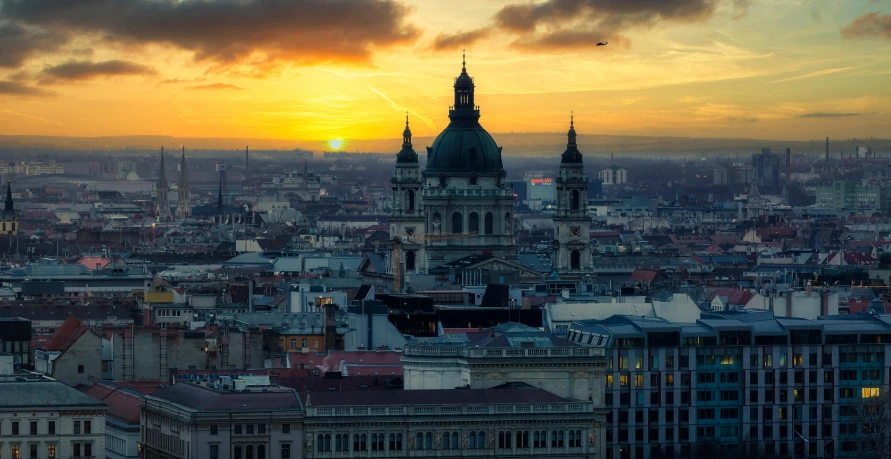 an aerial view of a city at sunset, by Bertalan Székely, pexels contest winner, baroque, square, desktop background, header text”, budapest