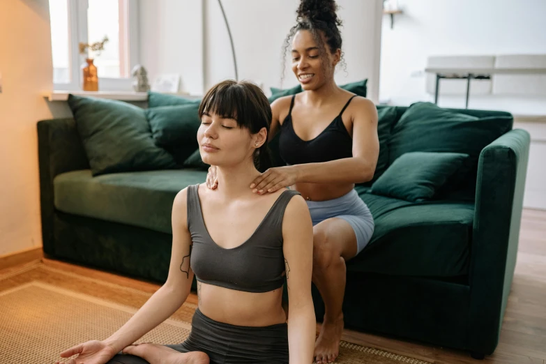 two women doing yoga together in a living room, by Carey Morris, trending on pexels, renaissance, paradise garden massage, looking her shoulder, straya, black