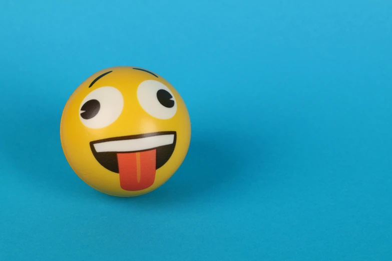 a yellow ball with a tongue sticking out of it, trending on pexels, avatar image, 3 d print, micro expressions, inflatable