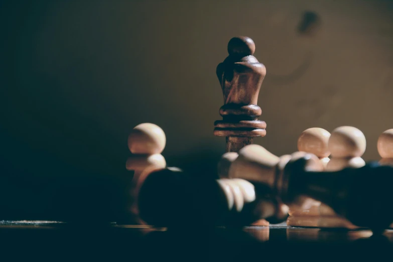 a group of wooden chess pieces sitting on top of a table, a picture, by Daniel Lieske, unsplash, intense fighting, 15081959 21121991 01012000 4k, instagram post, alessio albi