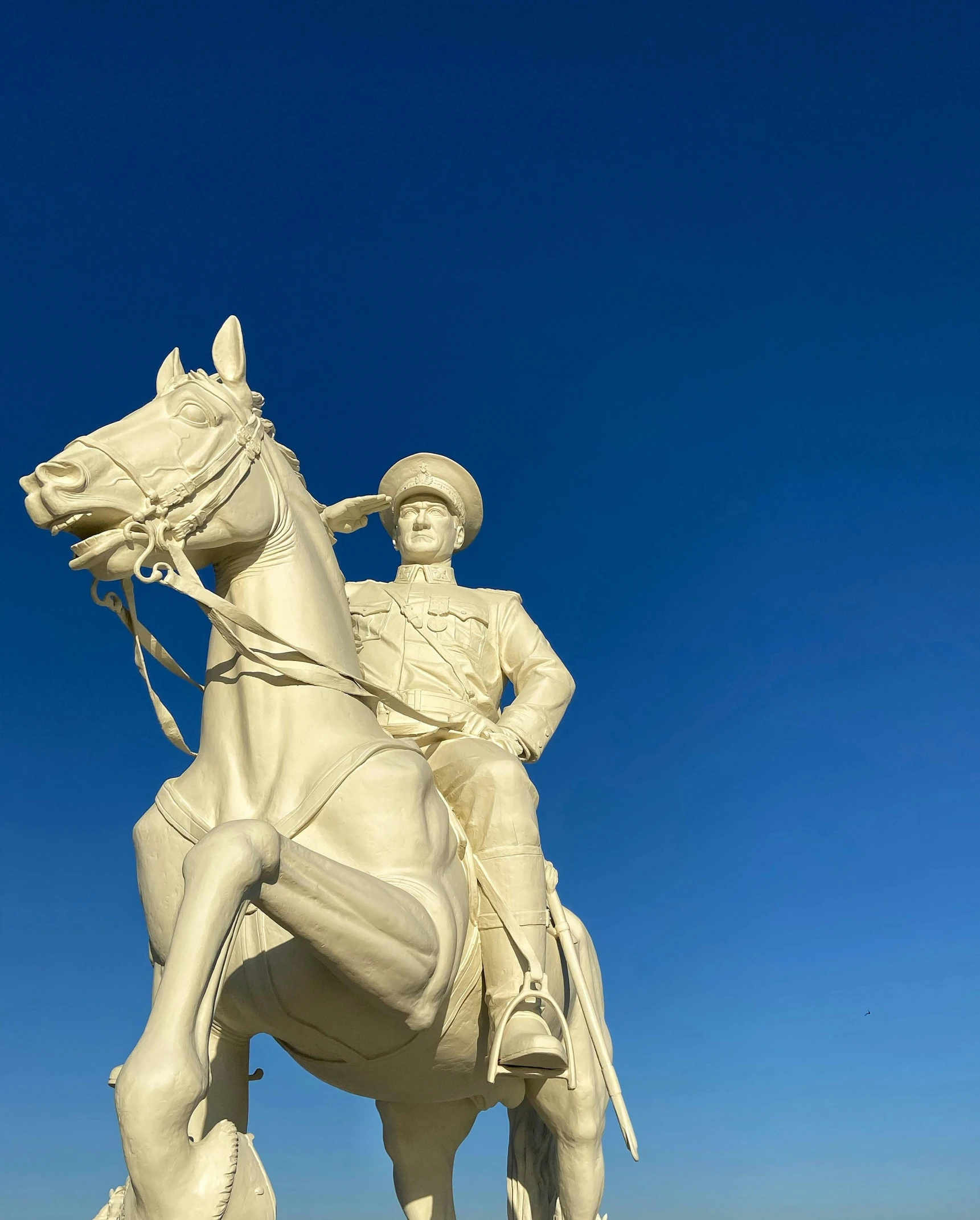 a statue of a man riding on the back of a horse, by Miroslava Sviridova, unsplash, socialist realism, clear blue skies, lgbtq, square, queen victoria