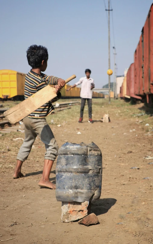 a young boy hitting a baseball with a bat, flickr, conceptual art, nepal, boxcar on the railroad, 15081959 21121991 01012000 4k, square