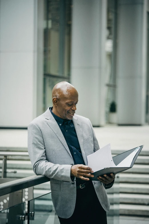 a couple of men standing next to each other, by William Berra, pexels contest winner, renaissance, holding notebook, corporate style, samuel jackson, photo of a 50-year-old white man